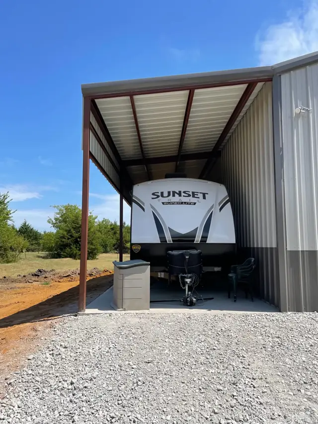 Metal RV cover with a lean-to