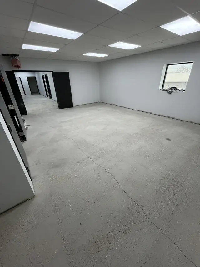 Open office area with a drop ceiling