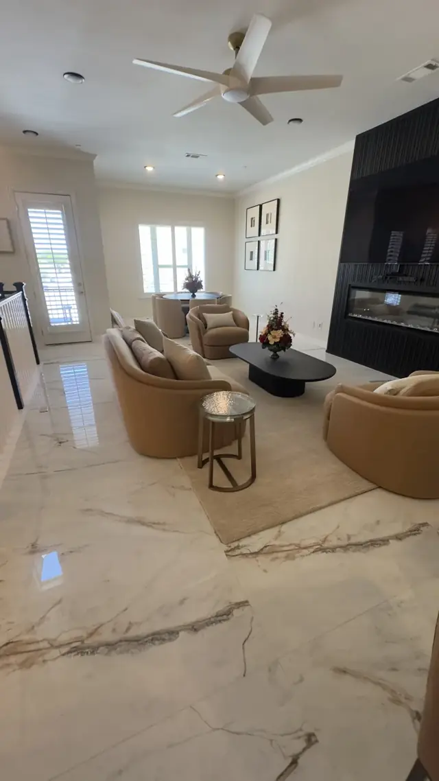 Townhome living room with marble-look floors