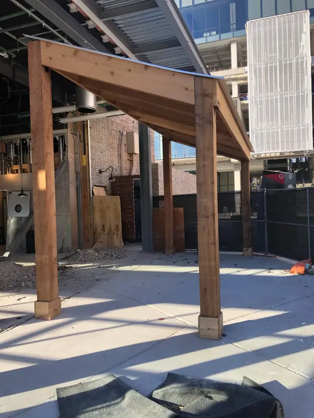 Cedar pergola at a mixed-use retail center