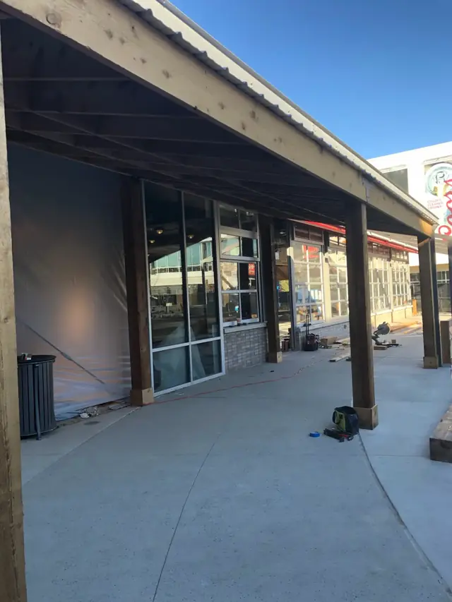 Storefront canopy with cedar posts